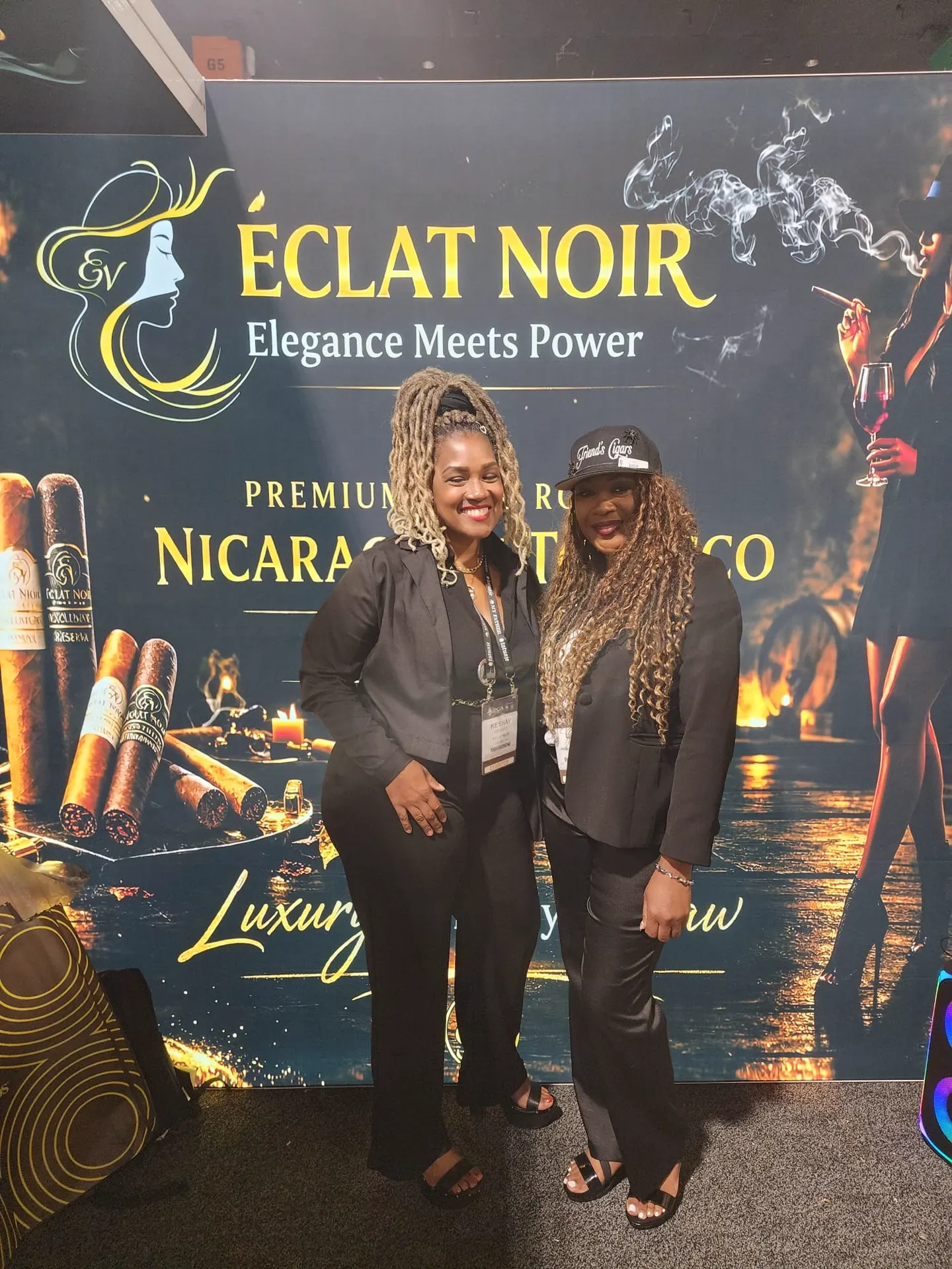 Founder and CEO L. Howard with a fellow industry professional at the ÉCLAT NOIR booth, PCA Trade Show, New Orleans, April 2026.