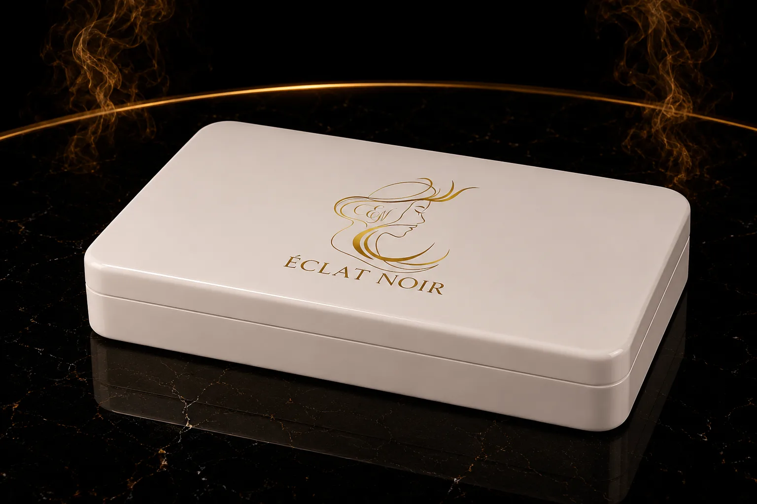 Closed ÉCLAT NOIR white lacquer presentation box with gold face mark on black marble.