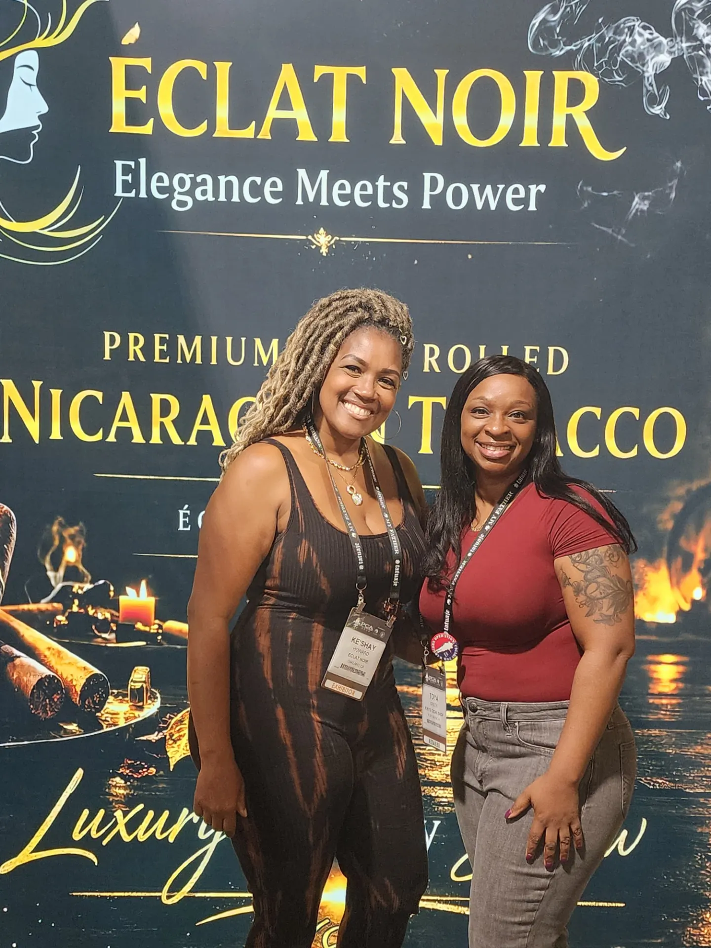 Founder and CEO L. Howard with a cigar shop owner in front of the ÉCLAT NOIR banner, PCA Trade Show, New Orleans, April 2026.